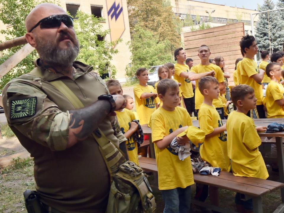 Children taking part in military training with Azov Battalion volunteers in Kyiv in August 2015 (Sergei Supinsky/AFP/Getty)