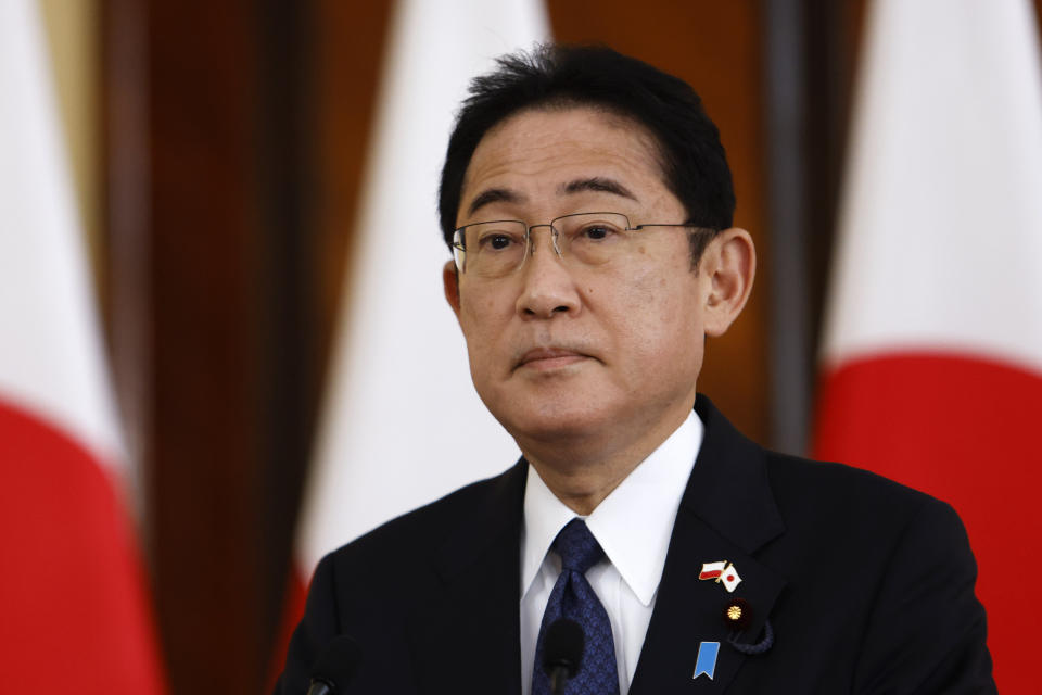 Japanese Prime Minister Fumio Kishida listens to the media at a press conference during his visit in Warsaw, Poland, Wednesday, March 22, 2023. (AP Photo/Michal Dyjuk)