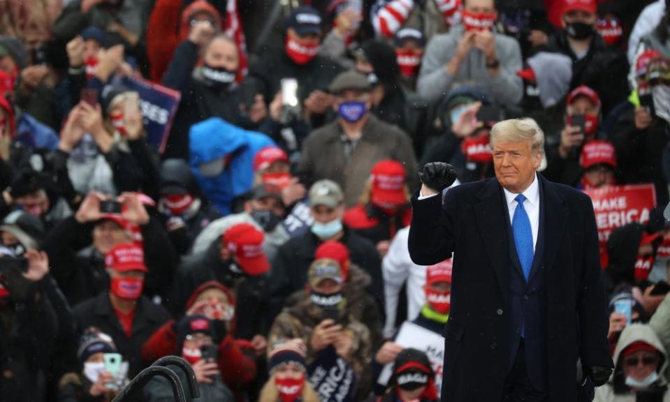 Donald Trump at a campaign rally in Lansing, Michigan, on 27 October.