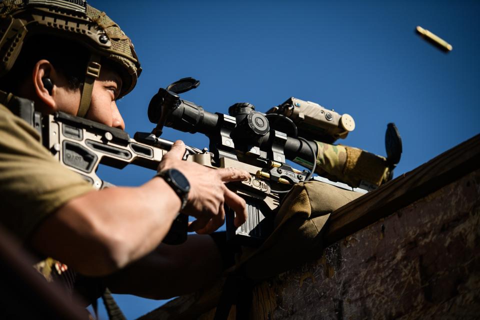 A 1st Special Forces Group sniper team competes in the USASOC International Sniper Competition at Fort Liberty on Tuesday, March 19, 2024.