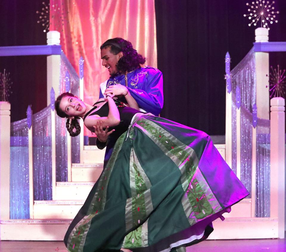 Lina Nasr, as Anna, and Victor Bissoondyal, as Hans, dance, Tuesday, Feb. 6, 2024, during dress rehearsal of Spruce Creek High School's production of Disney's "Frozen Jr."