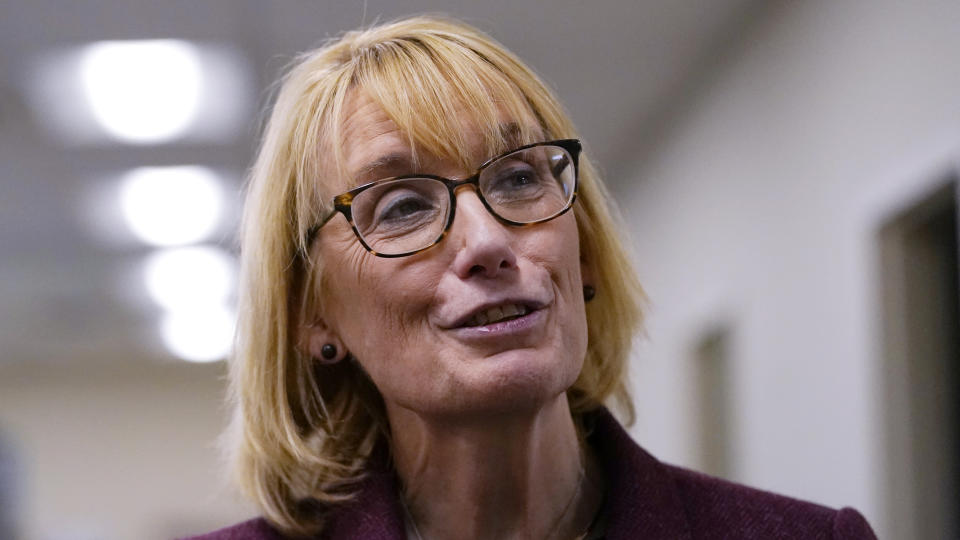 FILE - Sen. Maggie Hassan, D-N.H., talks with workers while touring a family-owned electric products manufacturing company on a campaign stop, Tuesday, Oct. 11, 2022, in Rochester, N.H. Sen. Hassan is facing Republican Don Bolduc in the general election. (AP Photo/Charles Krupa, File)