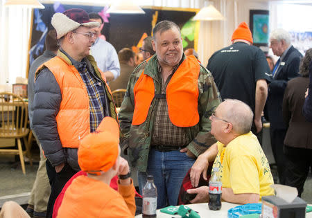 FILE PHOTO: Vermont Federation of Sportsmen's Club members and pro-gun supporters mingle at the annual Sportsmen's Legislative Mixer in Montpelier, Vermont, U.S., March 13, 2018. REUTERS/Christinne Muschi/File Photo