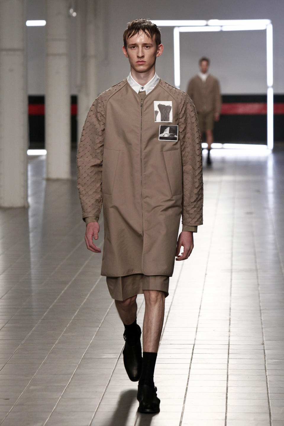 A model presents a creation by German fashion designer Damir Doma as part of his men's fashion Spring-Summer 2014 collection, presented Saturday, June 29, 2013 in Paris. (AP Photo/Thibault Camus)