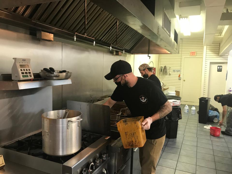 Dan Walsh makes chicken wings in the kitchen of his restaurant, Cockadoodle Dan's in Palmyra. The eatery is known for its wings, cheesesteaks and more.