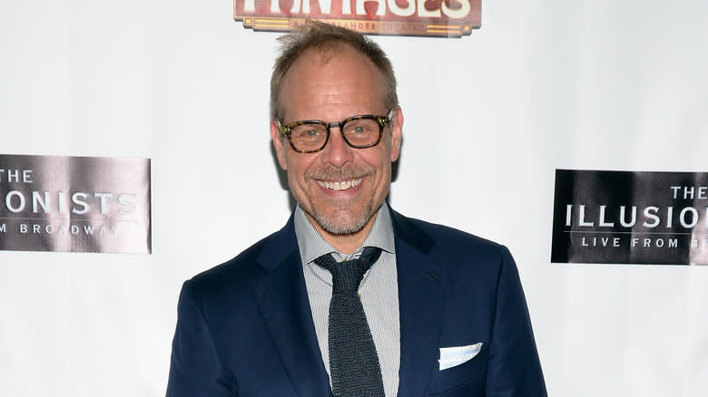 Alton Brown wearing blue suit