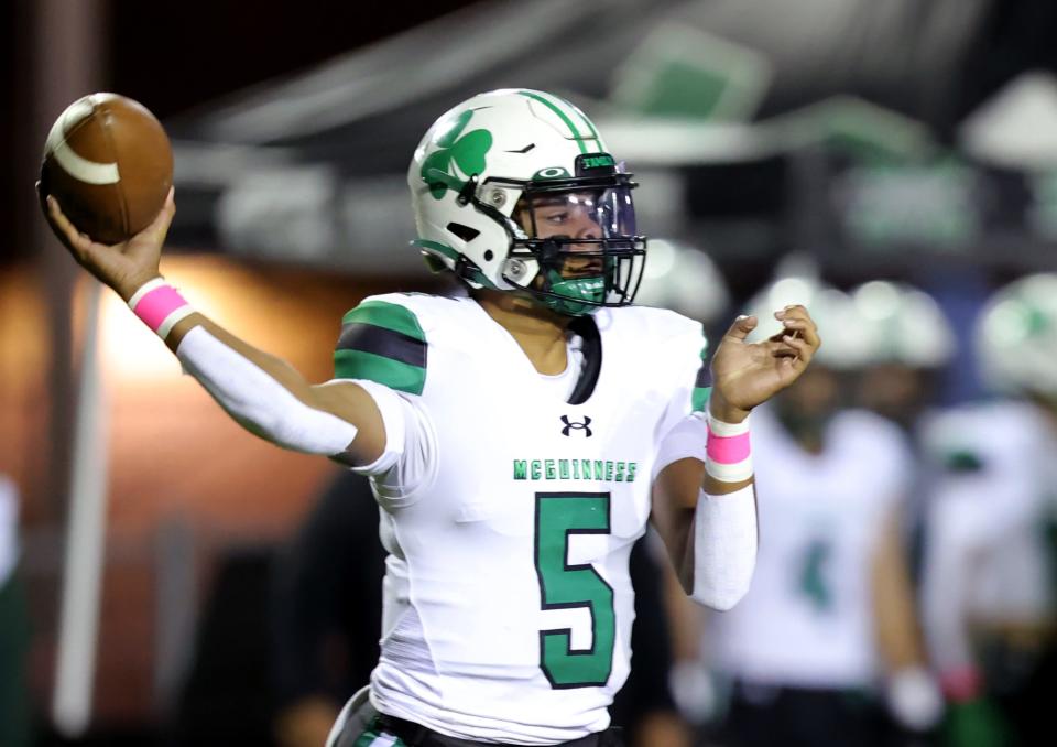 Bishop McGuinness' Damon Cochran II throws a pass against Carl Albert on Oct. 13 in Midwest City.