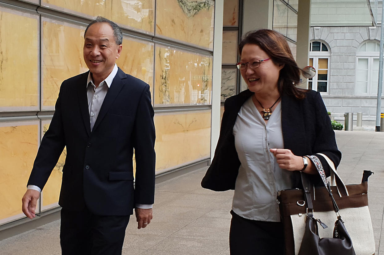 Former Workers' Party chief Low Thia Khiang and WP chairman Sylvia Lim seen outside the Supreme Court last Tuesday (16 October). (PHOTO: Wan Ting Koh / Yahoo News Singapore)