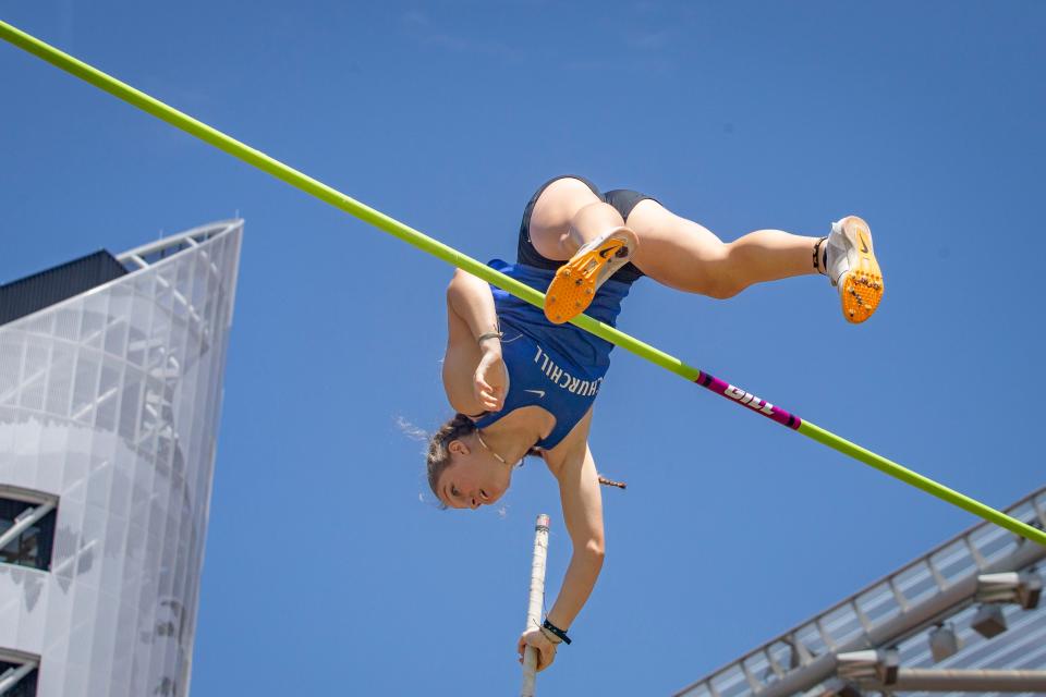 Addison Kleinke clears the bar to set a new meet record while competing for Churchill at the OSAA state track and field championships at Hayward Field in Eugene Saturday, May 27, 2023.