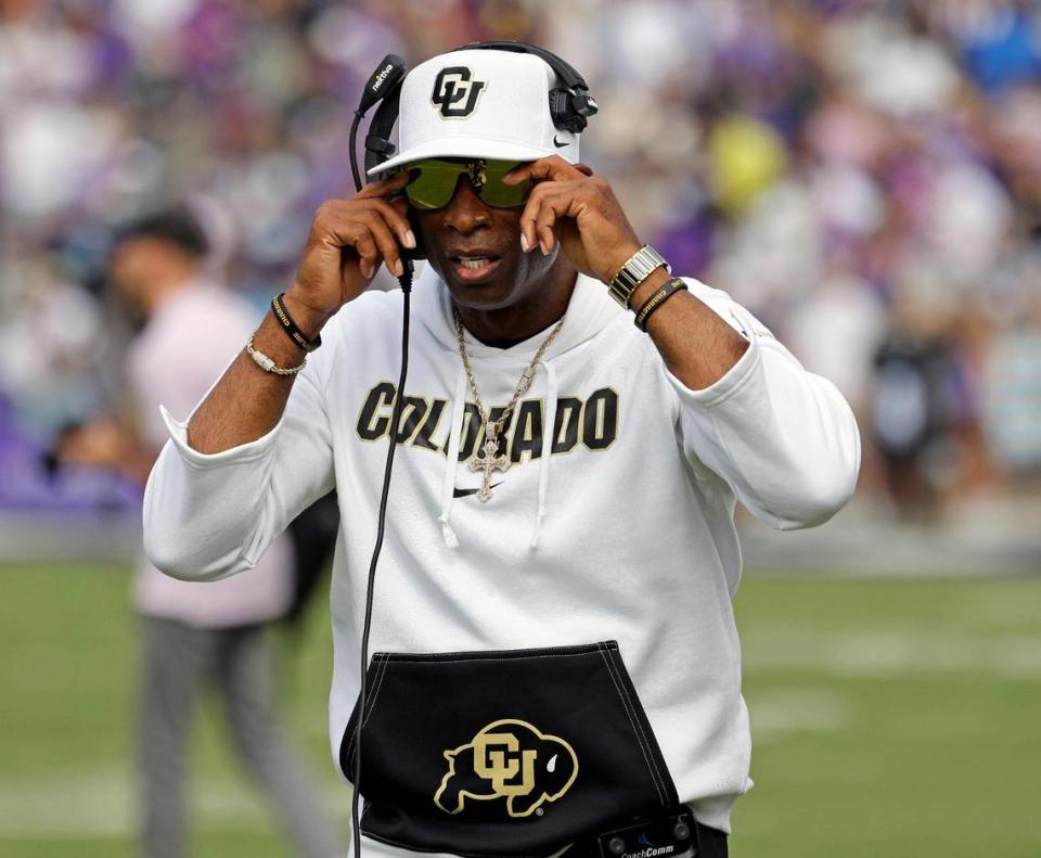 Colorado head coach Deion Sanders adjusts his sun glasses before the first half of a NCAA football game at Amon G. Carter Stadium in Fort Worth,Texas, Saturday Sept. 02, 2023. (Special to the Star-Telegram Bob Booth)