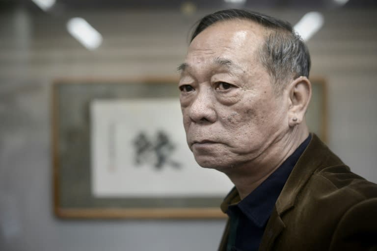 Jin Yulan, the nephew of China's last emperor Pu Yi, looking on during his private antique collection show in Beijing