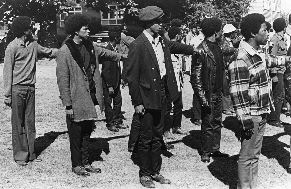 Members of the Black Panthers line up in a paramilitary formation at an anti-fascist demonstration in Oakland, California, on Dec. 20, 1969.