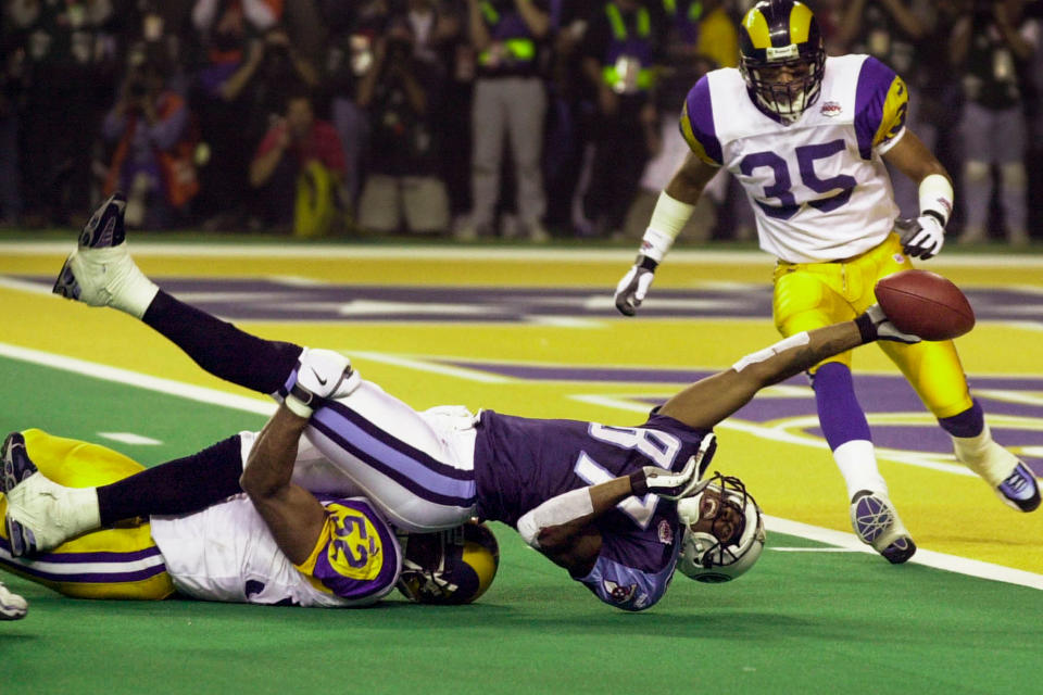 St. Louis Rams linebacker Mike Jones keeps Tennessee Titans wide receiver Kevin Dyson a tantalizing yard short of the end zone on the final play of Super Bowl XXXIV, on Jan. 30, 2000; the Rams prevailed, 23-16.<span class="copyright">Smiley N. Pool—<a class="link " href="https://sports.yahoo.com/nfl/teams/houston/" data-i13n="sec:content-canvas;subsec:anchor_text;elm:context_link" data-ylk="slk:Houston;sec:content-canvas;subsec:anchor_text;elm:context_link;itc:0">Houston</a> Chronicle/Getty Images</span>