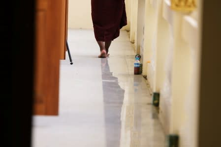Buddhist monk leaves the annual meeting of the nationalist group Buddha Dhamma Parahita Foundation, previously known as Ma Ba Tha in Yangon,