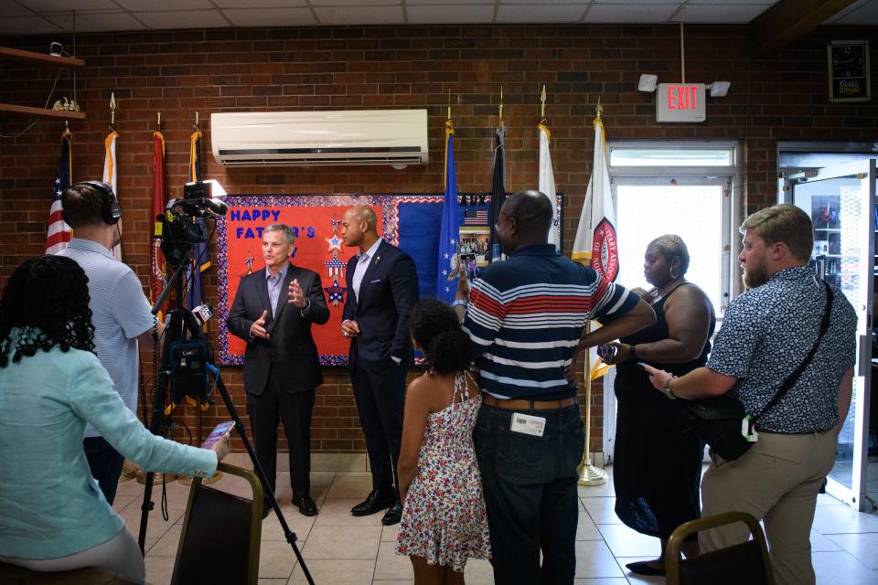 Attorney General Josh Stein and Maryland Gov. Wes Moore speak to the media at a campaign event on Tuesday, June 11, 2024, at the Retired Military Association in Fayetteville.