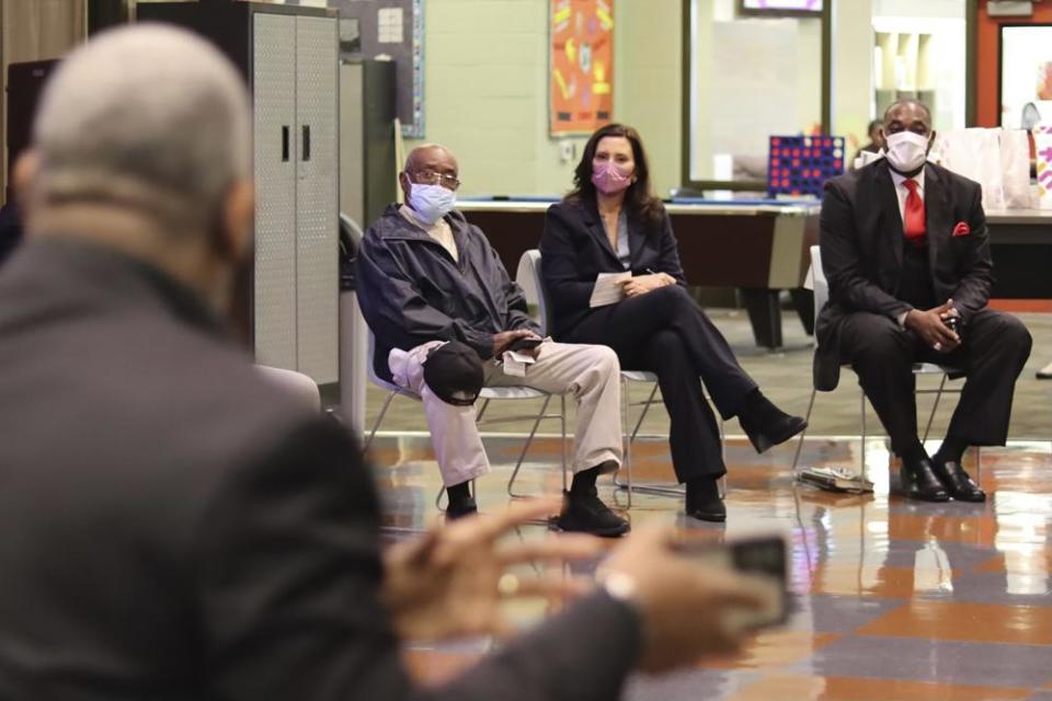 Gov. Gretchen Whitmer (D-Mich.), second from right, visits Benton Harbor, Mich. on Oct. 19, 2021, to listen to residents who have been urged to use bottled water because of elevated levels of lead in their tap water. (Michigan Office of the Governor via AP)