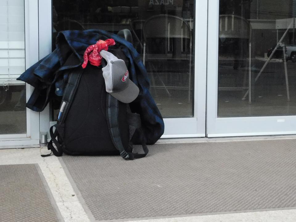 A backpack outside City Light Ministries, which serves the homeless in Abilene.