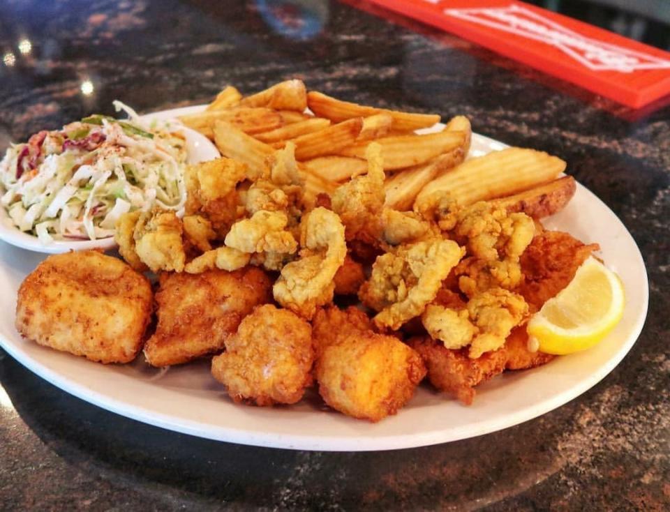 A heap of fried seafood makes up The Fisherman's Platter at The Clam Bake in south Fort Myers.