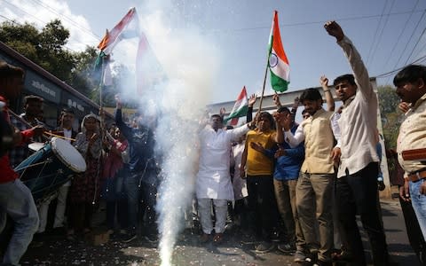 Indian residents let off fireworks to celebrate the Indian Air Force (IAF) strike launched on a Jaish-e-Mohammad (JeM) camp at Balakot, in Bhopal in the Madhya Pradesh state on February 26, 2019. - Credit: AFP