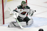 Minnesota Wild goaltender Kaapo Kahkonen stops a shot by the Anaheim Ducks during the second period of an NHL hockey game in Anaheim, Calif., Wednesday, Jan. 20, 2021. (AP Photo/Alex Gallardo)