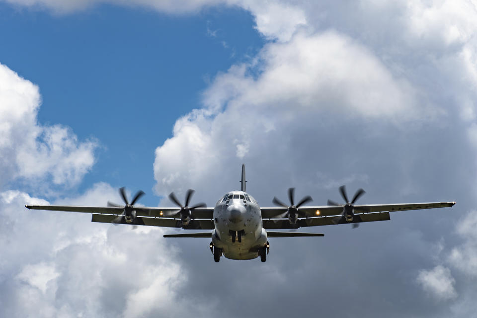 In this photo taken Aug. 26, 2019 and released by the U.S. Air Force, A U.S. Air Force C-130J Super Hercules approaches for landing at Camp Simba, Manda Bay, Kenya. The al-Shabab extremist group said Sunday, Jan. 5, 2020 that it has attacked the Camp Simba military base used by U.S. and Kenyan troops in coastal Kenya, while Kenya's military says the attempted pre-dawn breach was repulsed and at least four attackers were killed. (Staff Sgt. Devin Boyer/U.S. Air Force via AP)