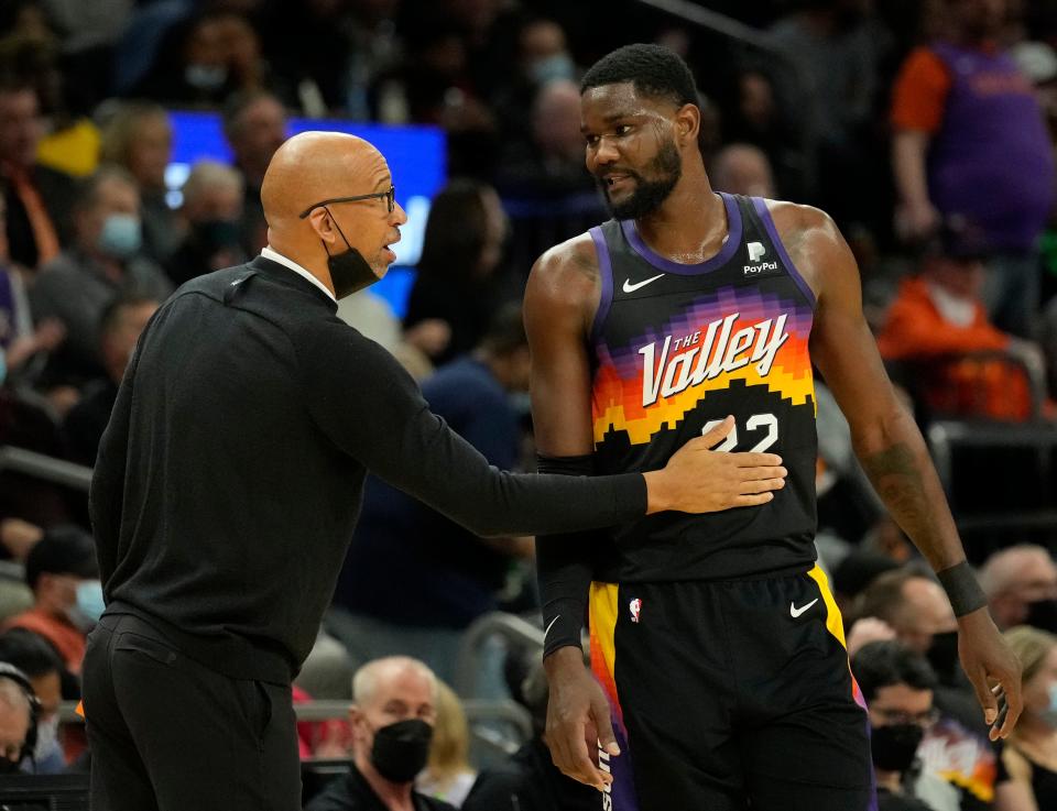 Feb 1, 2022; Phoenix, Arizona, United States;  Phoenix Suns head coach Monty Williams talks with Phoenix Suns center Deandre Ayton (22) during the first quarter against the Brooklyn Nets at Footprint Center.