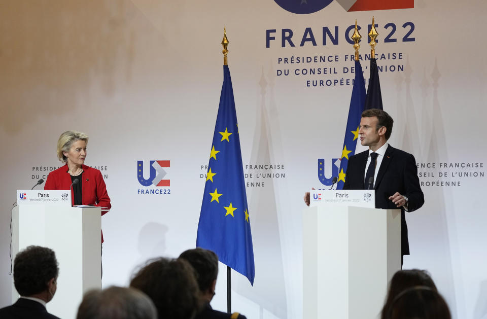 French President Emmanuel Macron, right, and European Commission President Ursula von der Leyen participate in a media conference after a meeting at the Elysee Palace in Paris, France, Friday, Jan. 7, 2022. (AP Photo/Michel Euler, Pool)