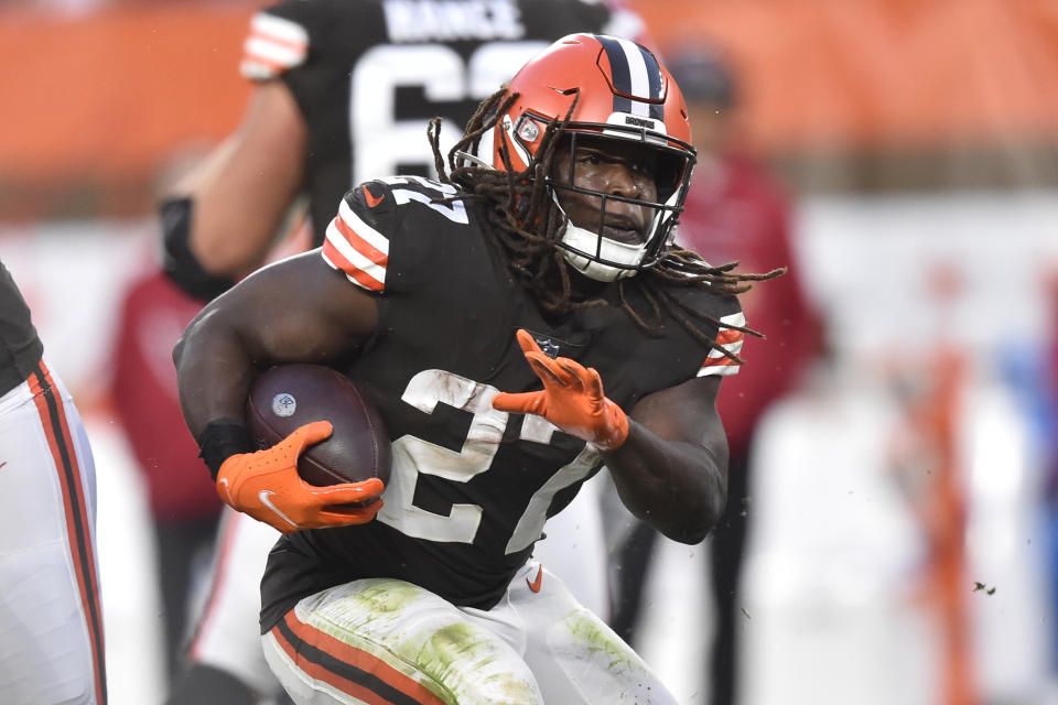 FILE - Cleveland Browns running back Kareem Hunt runs with the ball during an NFL football game against the Arizona Cardinals, Sunday, Oct. 17, 2021, in Cleveland. The Browns activated Hunt and Pro Bowl right tackle Jack Conklin from injured reserve and will have them in the lineup for Sunday, Nov. 28, critical game against the AFC North-leading Baltimore Ravens. (AP Photo/David Richard, File)