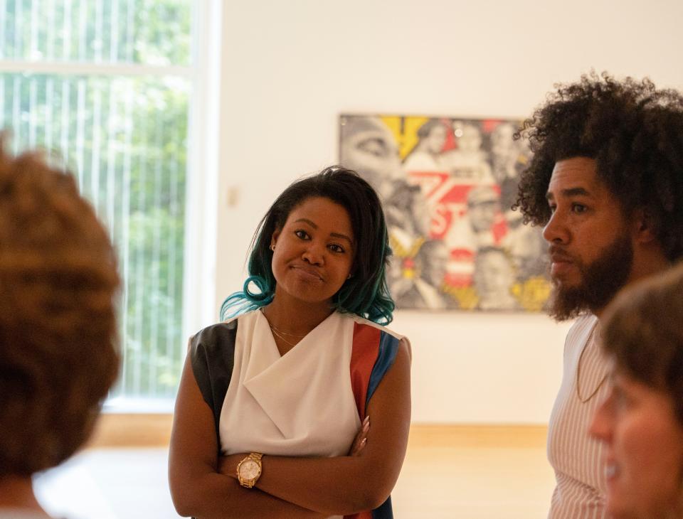 Guest-curators Mali Jeffers, left, and Alan Bacon discuss their 'We. The Culture' gallery Tuesday, Sept. 20, 2022, at the Indianapolis Museum of Art at Newfields.