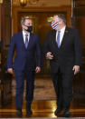 CORRECTS NAME TO AZERBAIJAN FOREIGN MINISTER JEYHAN BAYRAMOV - Secretary of State Mike Pompeo walks out to face reporters with Azerbaijan Foreign Minister Jeyhun Bayramov, prior to holding talks, Friday, Oct. 23, 2020 at the State Department in Washington. (Hannah McKay/Pool via AP)