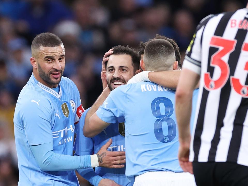 Bernardo Silva, centre, celebrates scoring his second goal  (Getty Images)