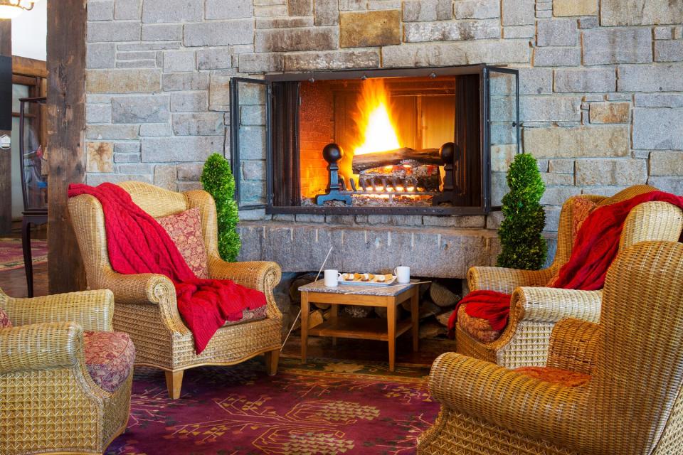 A fireplace inside of Samoset Resort during the wintertime