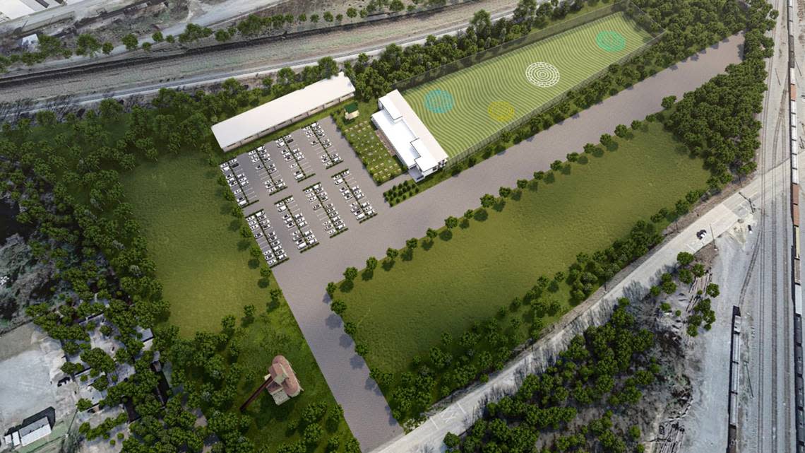 A site rendering for The Yard, a planned golf and pickleball entertainment venue planned by CW Development Holidings on their Seventh Street property in Macon on which the coaling tower stands.