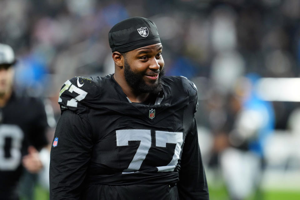 Dec 14, 2023; Paradise, Nevada, USA; Las Vegas Raiders offensive tackle Thayer Munford Jr. (77) smiles after the game against the Los Angeles Chargers at Allegiant Stadium. Mandatory Credit: Stephen R. Sylvanie-USA TODAY Sports