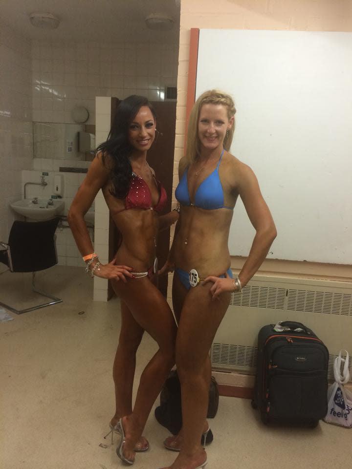 Danielle Holmes with another bodybuilder. (Supplied)