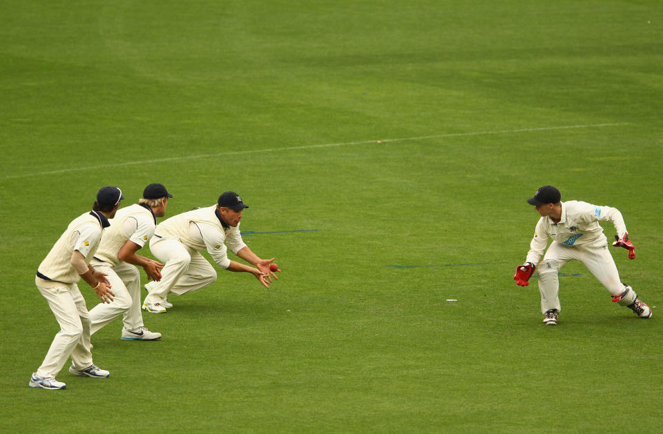 Aaron Finch of the Bushrangers takes a catch to dismiss Peter Nevill of the Blues during day one of the Sheffield Shield match between the Victoria Bushrangers and the New South Wales Blues at the Melbourne Cricket Ground on March 8, 2012 in Melbourne, Australia.