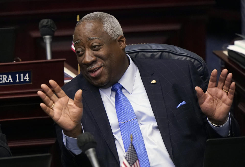 Florida Representatives Webster Barnaby chat during a break in a legislative session, Friday, April 30, 2021, at the Capitol in Tallahassee, Fla. Statehouse debate about LGBTQ+ rights has increasingly descended into personal attacks and ran counter to the traditional practices of maintaining decorum and respect for one's colleagues. During a recent committee debate in Florida, Barnaby called trans people "demons," "mutants" and "imps." (AP Photo/Wilfredo Lee)