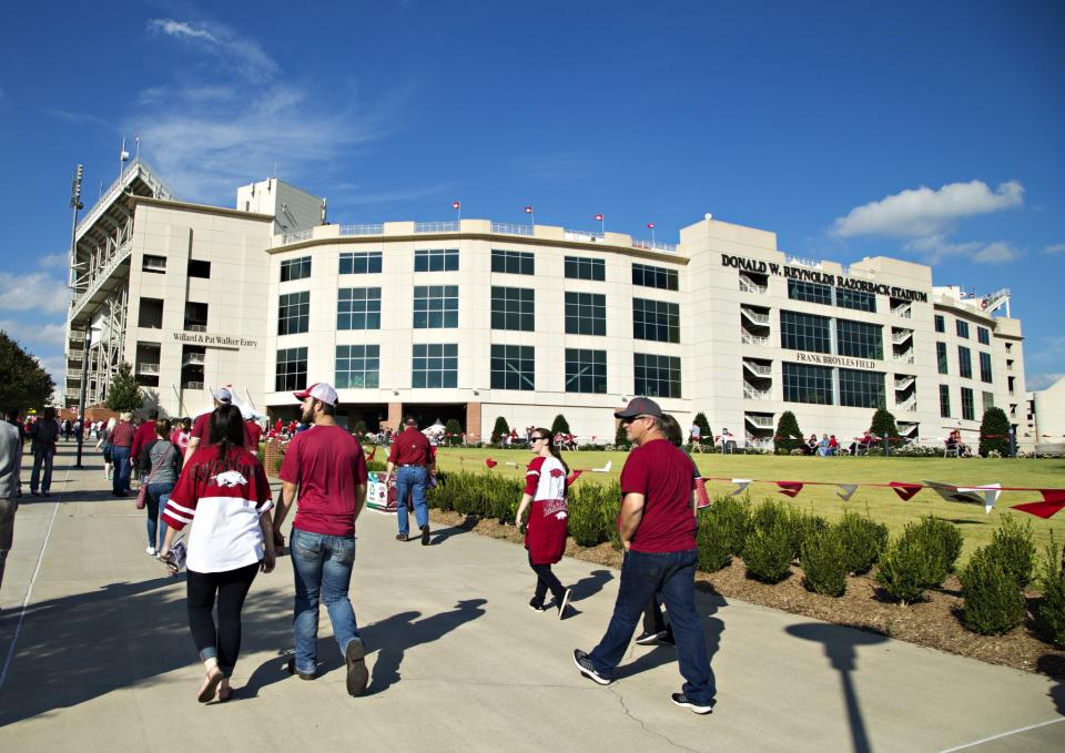 Fans with additional training would be allowed to bring concealed handguns into Razorback Stadium. (Getty)