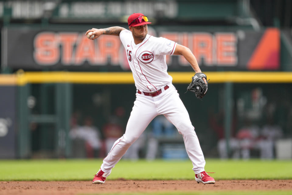 FILE - Cincinnati Reds third baseman Nick Senzel throws to first during the team's baseball game against the Miami Marlins on Aug. 9, 2023, in Cincinnati. Senzel became a free agent Friday night, Nov. 17, when the Reds declined to offer him a 2024 contract. AP Photo/Jeff Dean, File)