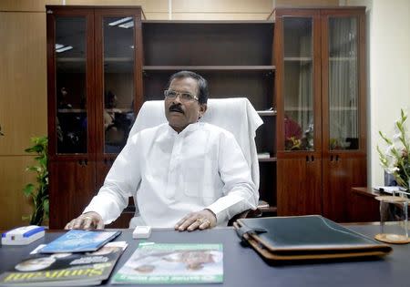 Shripad Naik, India's new minister in charge of the department of Ayurveda, Yoga and Naturopathy, Unani, Siddha and Homeopathy (AYUSH), sits inside his office in New Delhi November 11, 2014. REUTERS/Anindito Mukherjee