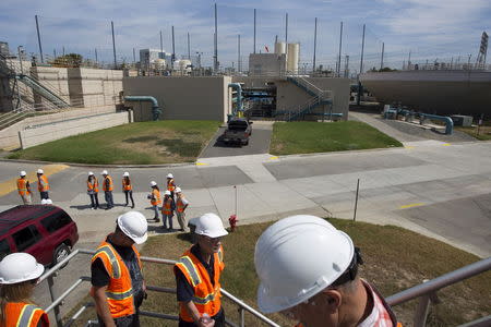 Members of the public walk through the Edward C. Little Water Recycling Facility during the West Basin Municipal Water District's tour of a water recycling facility in El Segundo, California July 11, 2015. REUTERS/David McNew