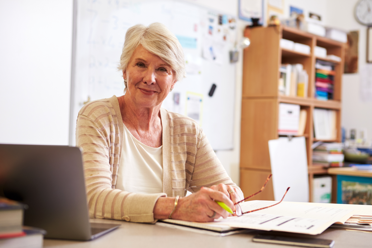 Senior woman at her work desk