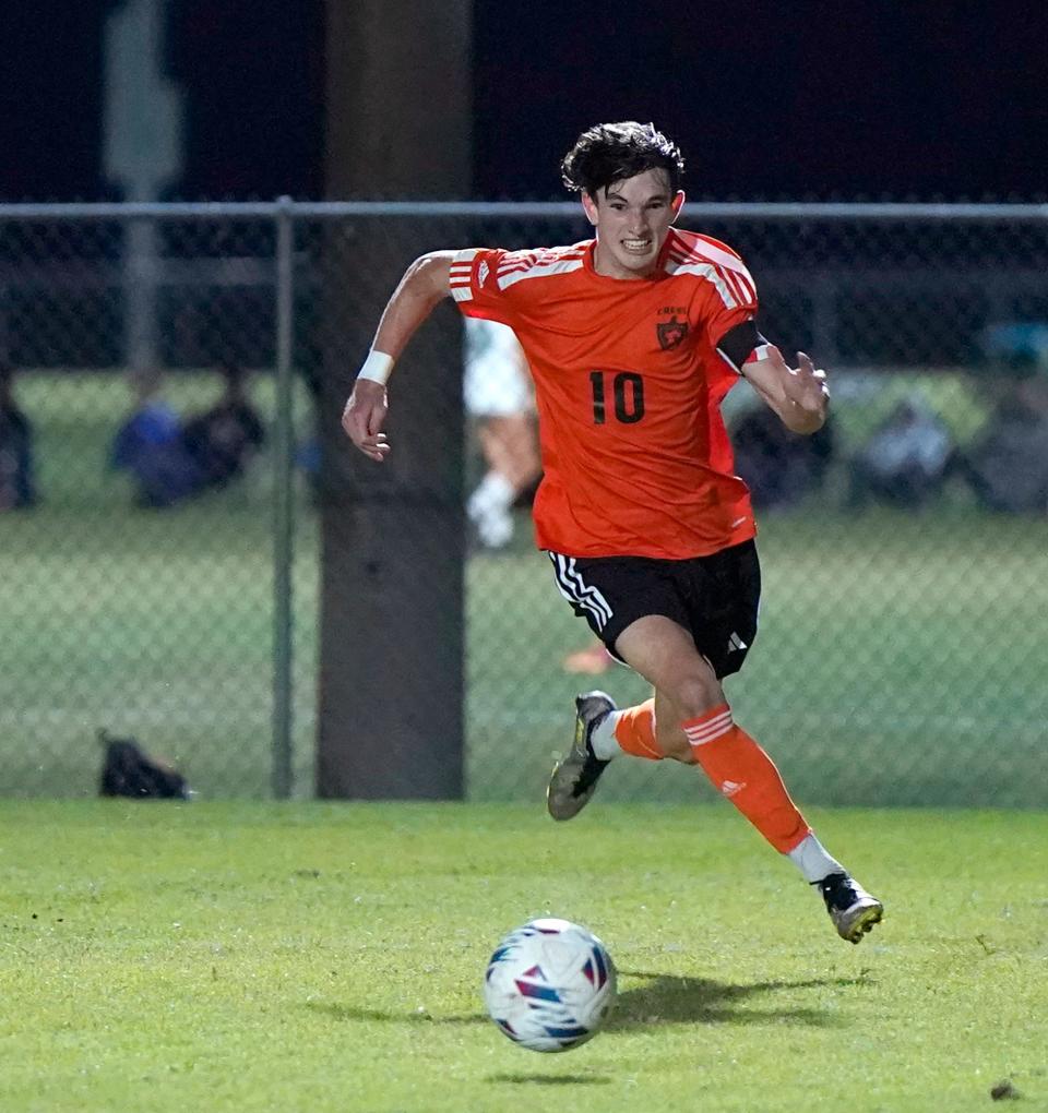 Spruce Creek's Tristan Bodnar drives towards the goal during a game with Flagler Palm Coast at Ormond Sports Complex, Tuesday, Jan. 16, 2024.