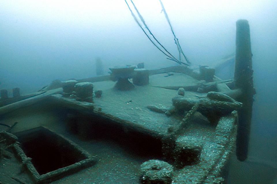 In this image taken from video provided by the Thunder Bay National Marine Sanctuary, the bow of the Ironton is seen in Lake Huron off Michigan's east coast in a June 2021 photo. Searchers have found the long-lost Great Lakes ship that came to a tragic end. Officials with the sanctuary in Alpena, Mich,, say they've located the Ironton, a freight schooner that plunged to the bottom of Lake Huron in 1894. The Ironton collided with another vessel in rough seas. Reports at the time said the seven-member crew scrambled into a lifeboat but it was tethered to the ship and pulled down. Five crewmen died.