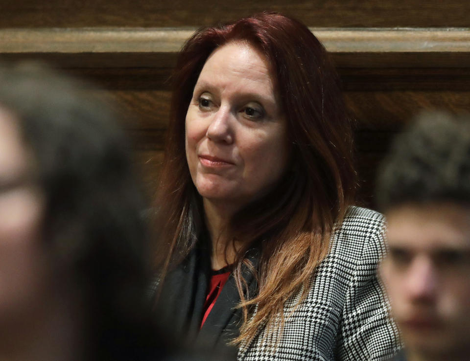 Washington Secretary of State Kim Wyman listens to testimony Tuesday, Jan. 22, 2019, as she attends a Washington Supreme Court hearing in Olympia, Wash., on a lawsuit addressing the constitutional freedom of electors to vote for any candidate for president, not just the nominee of their party. (AP Photo/Ted S. Warren)