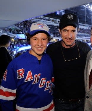 son Clyde in a Ranger's jersey