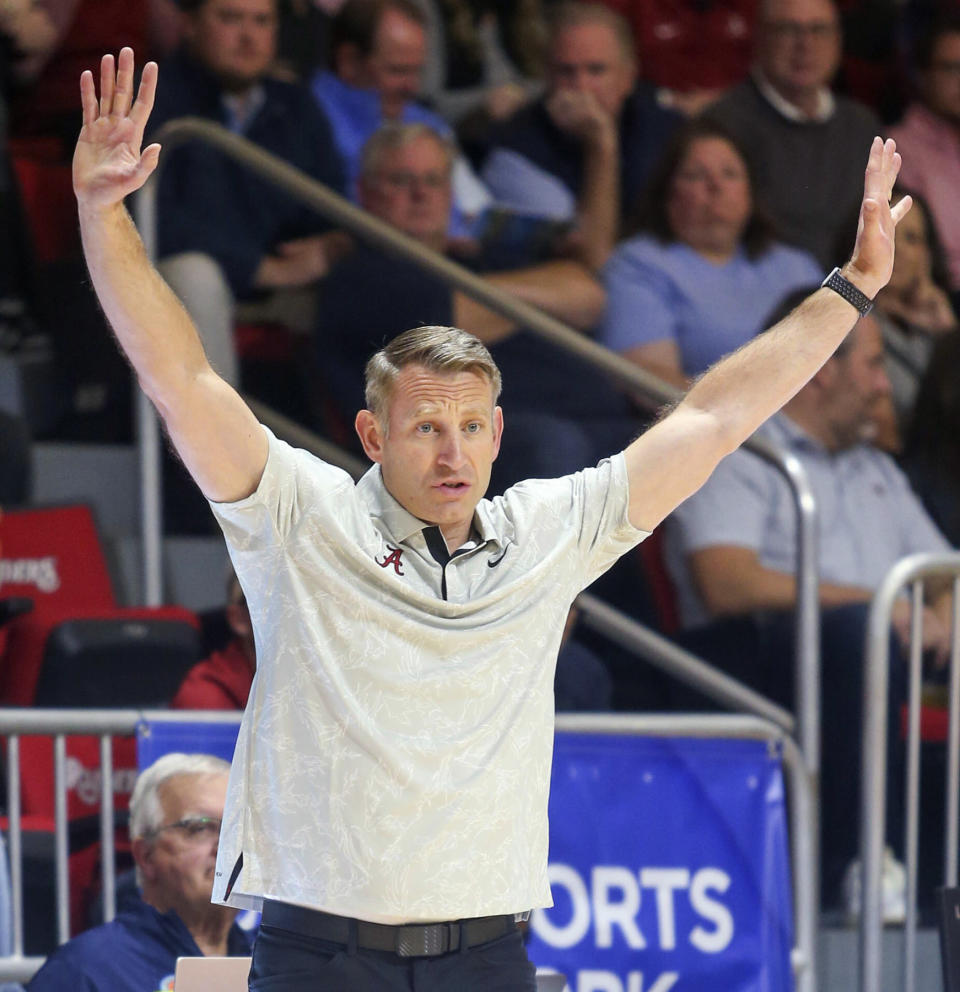 Alabama coach Nate Oats tells his players to keep their arms up on defense against Ohio State during the first half of an NCAA college basketball game Friday, Nov. 24, 2023, in Niceville, Fla. (AP Photo/Michael Snyder)