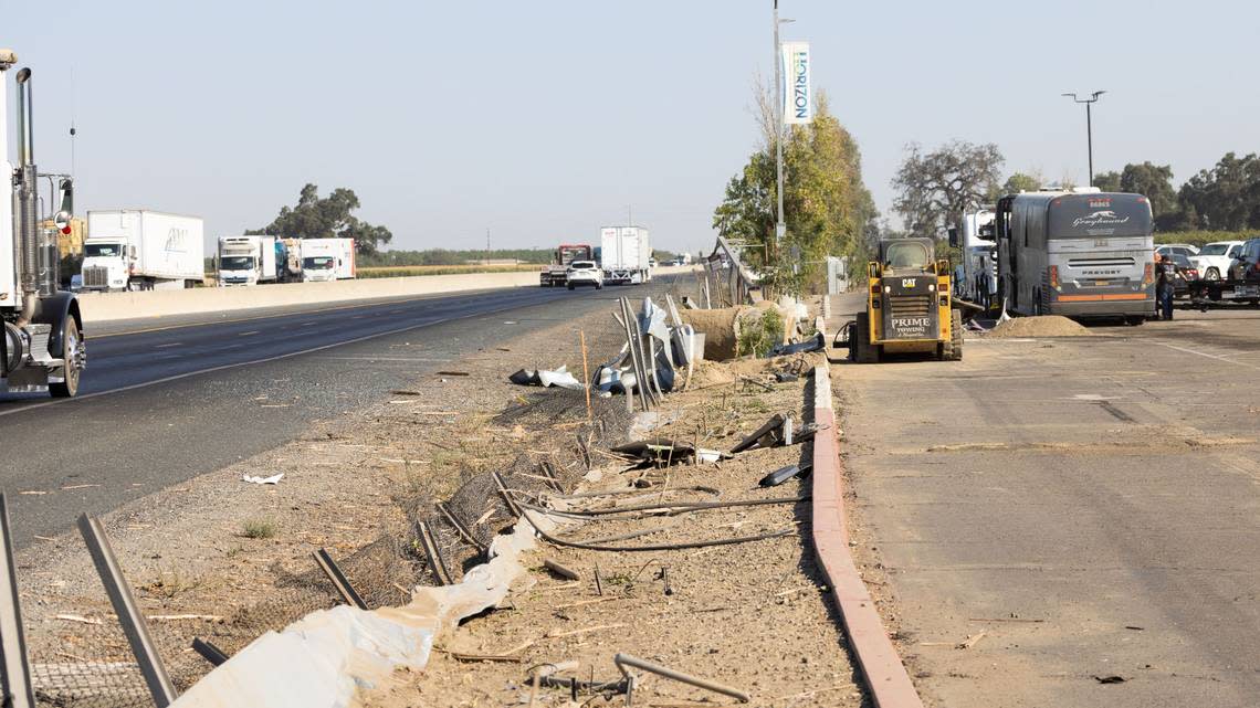 A tow truck righted a bus that left Highway 99, leveled a fence and landed on its side on Wednesday, Aug. 2, 2022, the California Highway Patrol said. At least half of the 34 passengers reported injuries. COURTESY OF VISALIA WATCHDOG