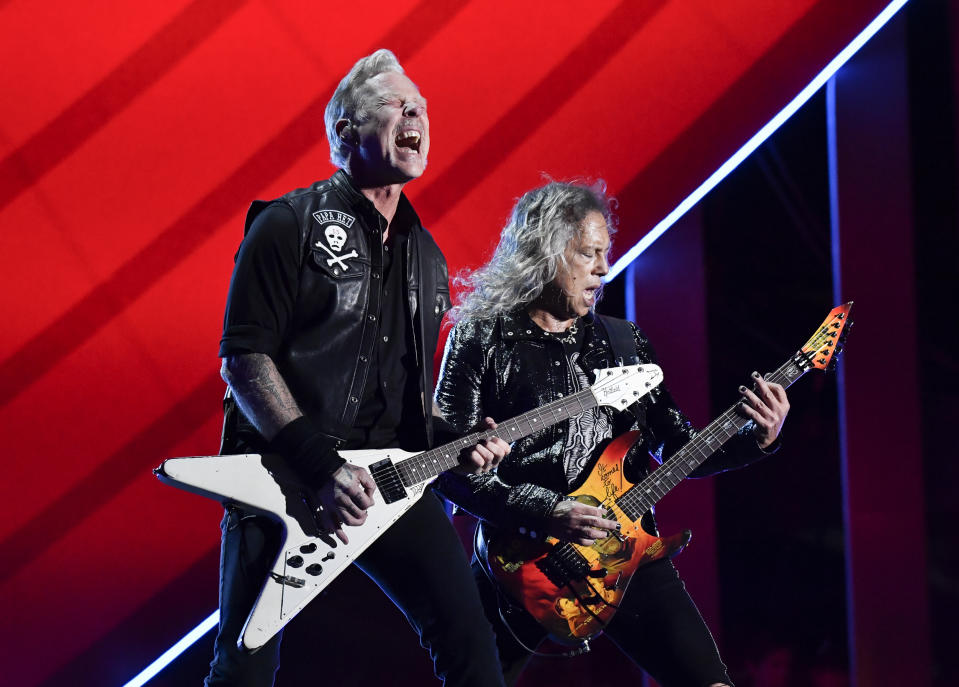 FILE - James Hetfield, left, and Kirk Hammett of Metallica perform during the Global Citizen Festival on Saturday, Sept. 24, 2022, at Central Park in New York. Metallica's latest album, "72 Seasons," releases Friday. (Photo by Evan Agostini/Invision/AP, File)