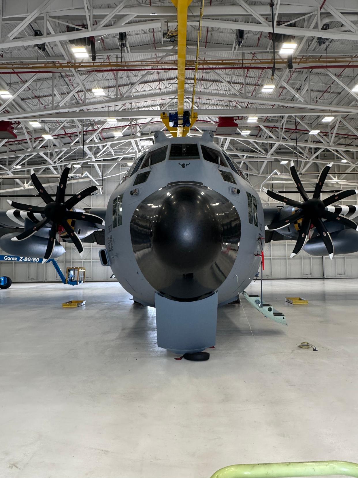 A C-130H Hercules cargo plane is parked for maintenance at the Montana Air National Guard base near Great Falls. The US Air Force has announced that the 120th Airlift Wing at Great Falls will receive eight new C-130J aircraft to replace the aging C-130Hs.